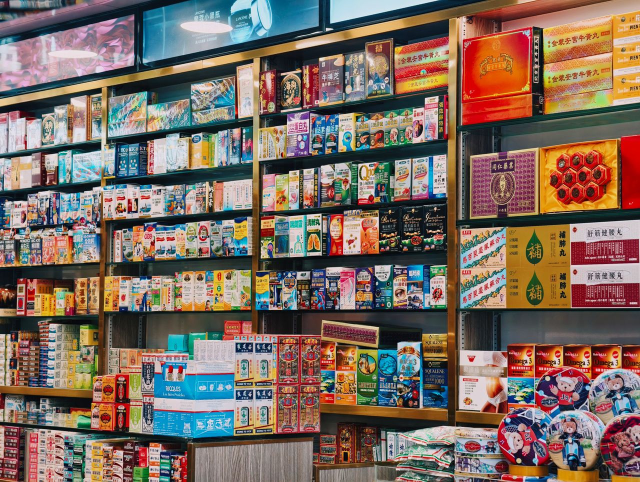 who-we-are Bright and colorful display of various Asian products on supermarket shelves.